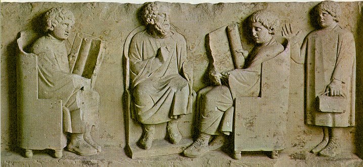 relief sculpture of ancient schoolroom